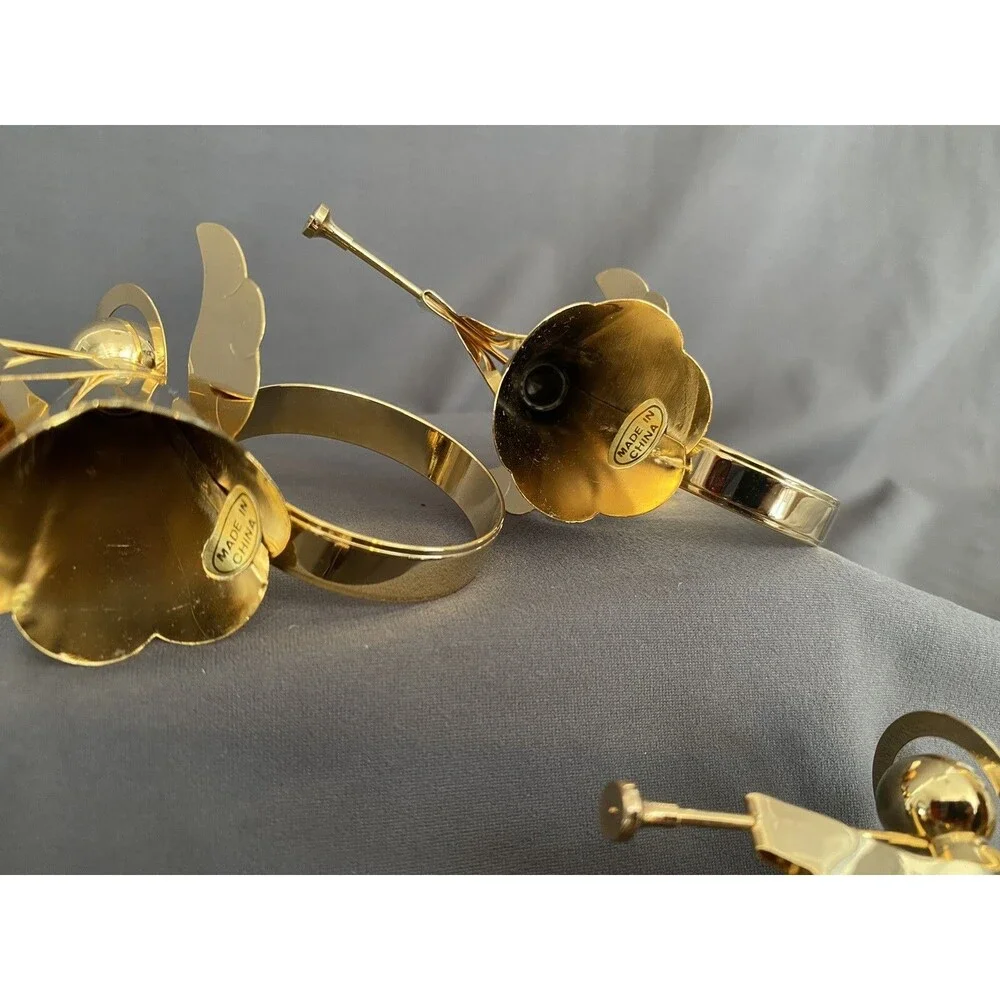 CHRISTMAS ANGEL TRUMPET BRASS GOLD TONE NAPKIN RINGS HOLDERS PLAYING TRUMPET SET
